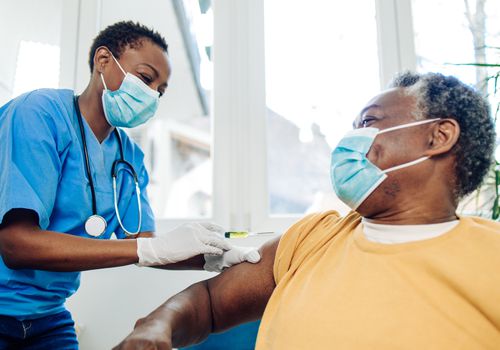 vaccinating black man